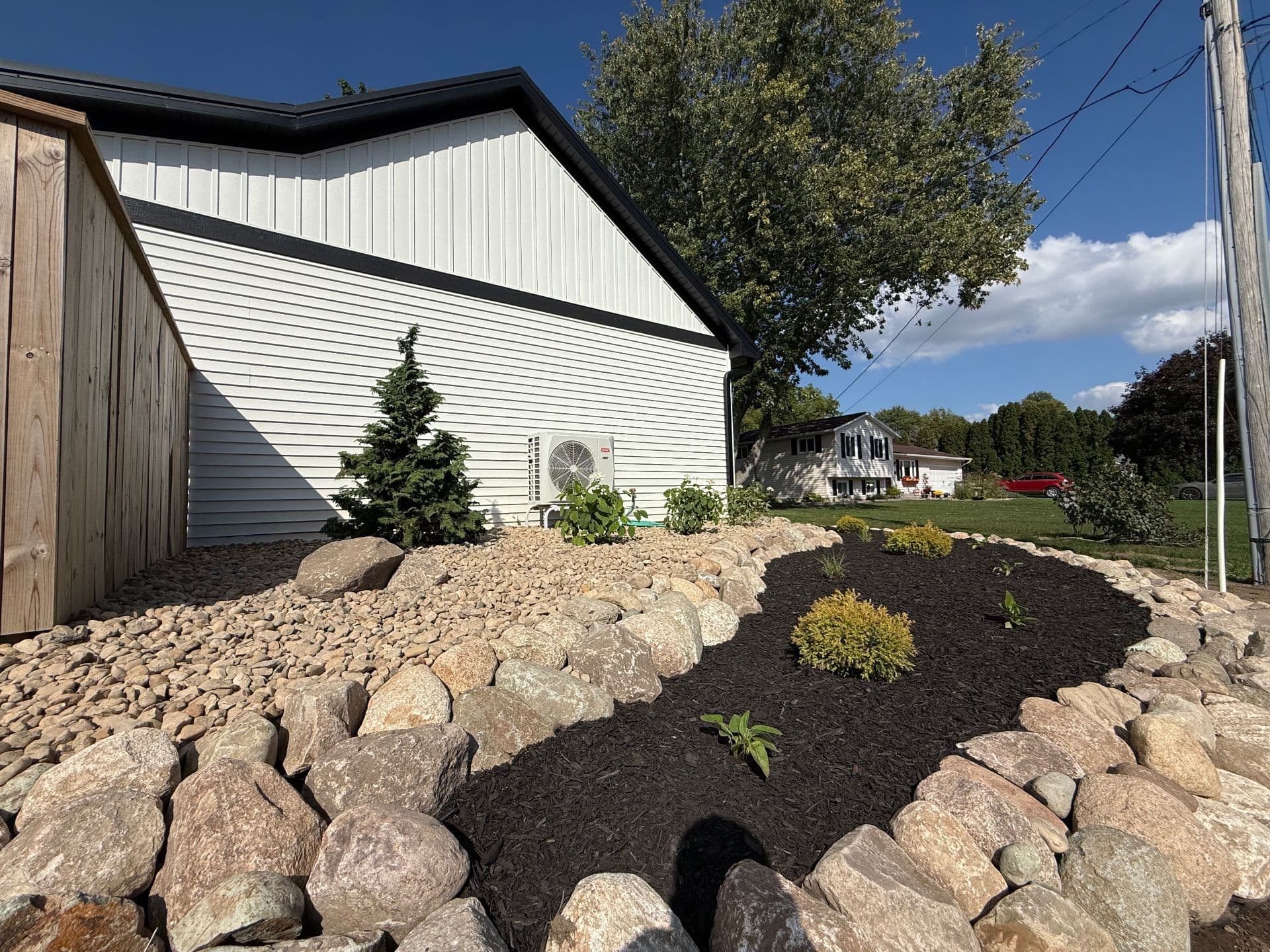 Gallery photos for Beautifully Crafted Tiered Boulder Wall with Lush Plantings: Image #3
