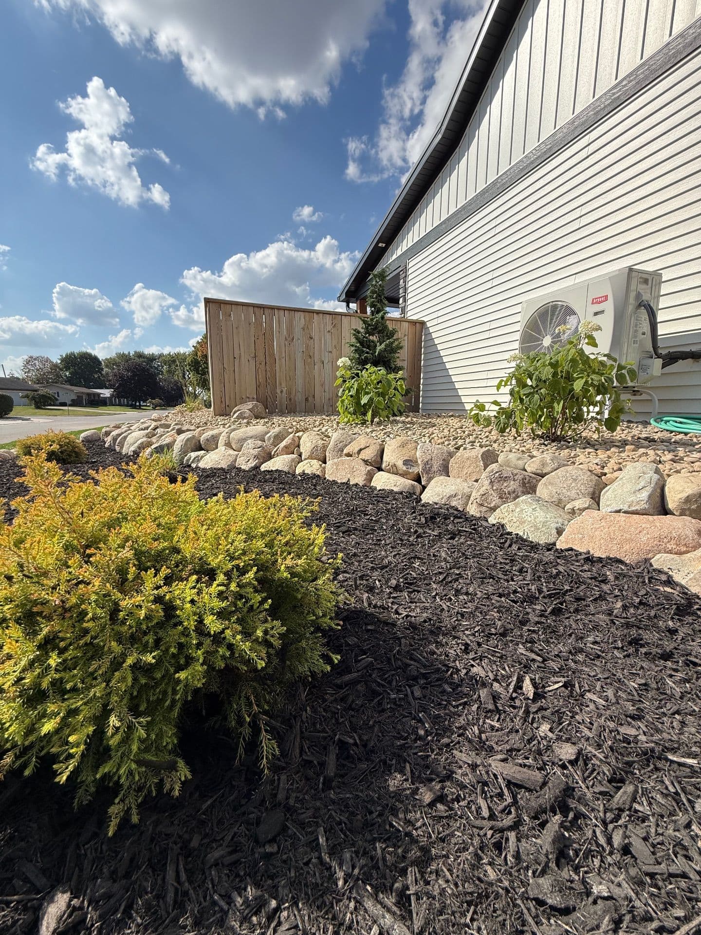 Gallery photos for Beautifully Crafted Tiered Boulder Wall with Lush Plantings: Image #5